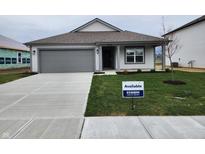 Charming single-story home with a gray garage door, fresh landscaping, and an inviting, covered entryway at 11305 N Quillow Way, Monrovia, IN 46157