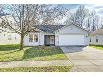 Charming single-story home with attached garage and well-maintained front yard at 11415 High Timber Dr, Indianapolis, IN 46235