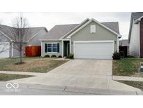 Charming single-Gathering home with a well-maintained lawn and a two-car garage at 2452 Bristol Dr, Franklin, IN 46131