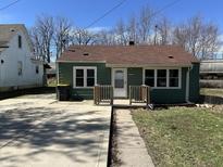 Charming single-Gathering home with a cozy front porch and well-maintained lawn at 1235 Indiana Ave, Anderson, IN 46012