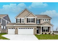 Two-story home with a three-car garage, brick accents, manicured lawn, and a welcoming front entrance at 20238 Allegheny Ln, Westfield, IN 46074