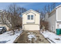 Charming two-story home with attached garage and well-maintained lawn in a desirable neighborhood at 6784 Stanhope Way, Indianapolis, IN 46254