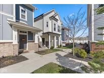 Charming townhomes with well-manicured landscaping and inviting curb appeal, perfect for modern living at 9208 Hawley Dr, Indianapolis, IN 46216