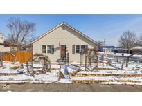 Charming home with a well-maintained front yard, featuring beautiful landscaping and a cozy entrance, perfect for curb appeal at 189 S St Clair St, Martinsville, IN 46151