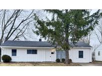 Charming single-story home with a well-maintained front yard and a classic white facade at 3527 N Wittfield St, Indianapolis, IN 46235