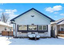 Charming bungalow-style home with unique curb appeal and eye-catching architectural details at 3329 W 10Th St, Indianapolis, IN 46222