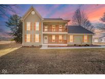 Charming two-story home with a welcoming front porch and beautiful architectural details at 4981 E County Road 200 S, Avon, IN 46123