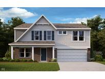 Charming two-story home featuring a brick facade, gabled roof, and a well-manicured lawn at 750 Oakleaf Dr, Greenfield, IN 46140