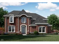 Charming two-story brick home with a well-manicured lawn and a classic architectural design at 6839 Oakdale Ln, Avon, IN 46123