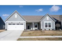 Charming single-Gathering home featuring a two-car garage, neutral siding, and well-manicured lawn at 720 Keck Way, Westfield, IN 46074