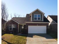 Charming single-Gathering home featuring a two-car garage and a well-maintained lawn at 1223 Blackthorne S Trl, Plainfield, IN 46168