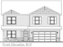Traditional two-story home features horizontal siding and a covered front entry at 1404 Bluebonnet Pl, Shelbyville, IN 46176