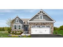Charming single-Gathering home featuring a two-car garage, stone accents, and beautiful landscaping at 2194 Walnut Fork Dr, Whitestown, IN 46075