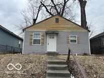Charming single-story home with gray siding and cozy curb appeal at 2732 N Dearborn St, Indianapolis, IN 46218