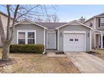Charming single-story home featuring a one-car garage and well-maintained landscaping at 14344 Cuppola Dr, Noblesville, IN 46060