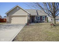 Charming single-Gathering home featuring a well-manicured lawn and a two-car garage at 2167 Meridian Springs Ln, Greenfield, IN 46140