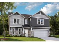 Charming two-story home with stone accents and a two-car garage, perfect for Gathering living at 7348 Deerberg Dr, Indianapolis, IN 46259