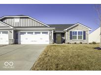 Charming single-Gathering home with a two-car garage and stone accents at 76 Gnarled Oak Ln, Whiteland, IN 46184