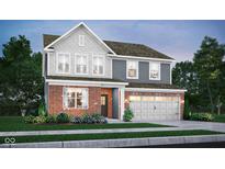 Charming two-story home with brick and gray siding, complemented by a well-manicured lawn and inviting curb appeal at 2725 Linwood Ave, Greenwood, IN 46143