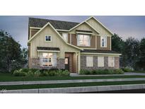 Charming two-story home with a mix of brick and siding, accented by manicured landscaping at 7516 Fallsworth Dr, Avon, IN 46123