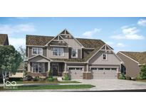Charming two-story home with gray siding, three-car garage, manicured lawn, and a welcoming front porch at 15372 Hurst Rd, Fishers, IN 46040