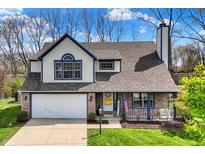 Charming two-story home with a well-maintained lawn, attached garage, and welcoming front porch at 17420 Dalton Ct, Noblesville, IN 46062