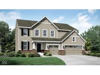 Charming two-story home showcasing neutral siding, a two-car garage, and lush landscaping at 3538 Planck Cir, Danville, IN 46122