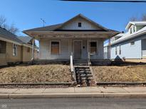 Charming single-Gathering home featuring a quaint front porch at 1709 Central Ave, Anderson, IN 46016