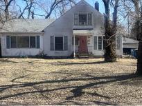 Charming home with a spacious front yard, offering potential for landscaping and outdoor enjoyment at 6833 Evanston Ave, Indianapolis, IN 46220