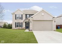 Charming two-story home features brick facade, large garage, landscaped yard, and classic architectural details at 18921 Silver Wing Ct, Noblesville, IN 46060