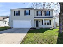 Charming two-story home with black shutters, a two-car garage, and a well-maintained lawn at 18924 Planer Dr, Noblesville, IN 46062