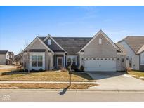 Charming single-Gathering home with well-maintained lawn and attached two-car garage at 10865 Mystic View Ct, Indianapolis, IN 46239