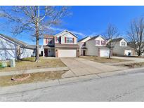 Charming two-story home with a well-maintained lawn and inviting curb appeal at 120 White Lick Dr, Indianapolis, IN 46227