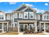 Charming townhome with a blend of stone and siding, offering a welcoming curb appeal and a modern design at 3644 Thomas Jefferson St, Westfield, IN 46074