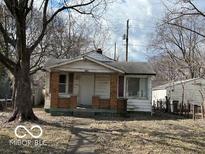 Quaint one-story home, small front porch and compact yard at 1122 Medford Ave, Indianapolis, IN 46222