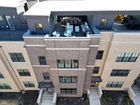 Stunning aerial view showcasing the building's rooftop terrace and overall design at 1208 N Alabama St, Indianapolis, IN 46202