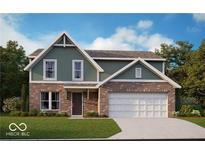 Charming two-story home featuring a brick and siding exterior with a two-car garage and well-manicured lawn at 335 Atlas Dr, Lebanon, IN 46052