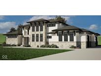 Beautiful two-story home with stone and stucco, dark trim windows, and a well-manicured lawn at 4094 Chapel Hill Ct, Bargersville, IN 46106