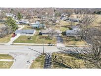 Wonderful aerial view of a neighborhood with mature trees and multiple homes at 435 Howard Rd, Greenwood, IN 46142