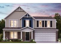 Charming two-story home with brick accents, attached two-car garage, and manicured lawn at 764 Oakleaf Dr, Greenfield, IN 46140