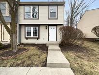 Charming home featuring a welcoming entrance, well-maintained exterior, and neat landscaping at 9435 Timber View Dr, Indianapolis, IN 46250