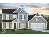 Charming two-story home featuring a mix of siding, gray shutters, gabled rooflines and a two-car garage at Vacant Lot 0 - 5750 W 650 N, Thorntown, IN 46071