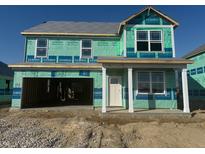 New two-story home featuring an attached two-car garage and covered porch awaiting personalization at 1358 Foxtail Ln, Greenwood, IN 46143