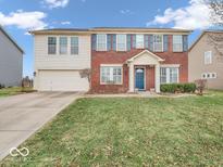 Traditional two-story home with a brick and siding exterior, attached garage, and well-maintained front lawn at 2808 Twinleaf Dr, Plainfield, IN 46168