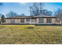 Charming, single story home with a sprawling front yard and mature trees at 5451 Buttonwood Dr, Noblesville, IN 46062
