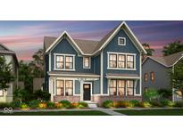 Charming two-story home with a well-manicured lawn and beautiful landscaping at 13610 Grand Abbey Way, Fishers, IN 46037
