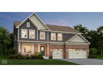 Charming two-story home with a brick facade, attached two-car garage, and well-manicured landscaping at 587 Mccaffrey Cir, Westfield, IN 46074