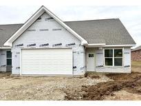New home exterior features a white garage door, white front door, gray shingle roof and large window at 614 Silver Fox Ct, Indianapolis, IN 46217