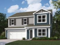 Charming two-story home featuring blue siding, shaker accents, white trim, and a two-car garage at 1346 Fleming Dr, Greenfield, IN 46140