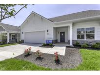 Charming single-Gathering home featuring a two-car garage, covered entry, and manicured front lawn at 16799 Imperial Ct, Fishers, IN 46040